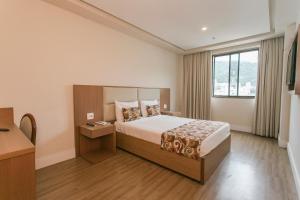 Кровать или кровати в номере Mirador Rio Copacabana Hotel