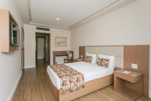 Кровать или кровати в номере Mirador Rio Copacabana Hotel