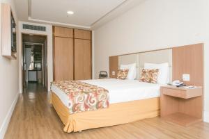 Кровать или кровати в номере Mirador Rio Copacabana Hotel