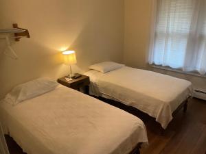 Postel nebo postele na pokoji v ubytování Cappuccio Hotel