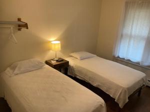 Postel nebo postele na pokoji v ubytování Cappuccio Hotel