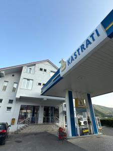 akritkrit gas station with a car parked in front of it at Bar-Hotel IRDI in Bulqizë