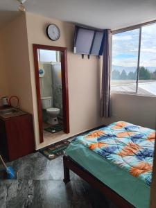 Postel nebo postele na pokoji v ubytování Apartamento