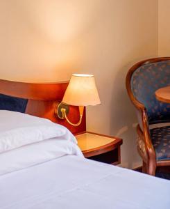 Posteľ alebo postele v izbe v ubytovaní Massimo Plaza Hotel