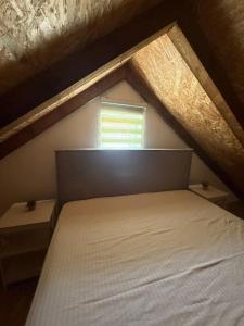 a bedroom with a bed and a window at Mila in Danilovgrad +27 photos