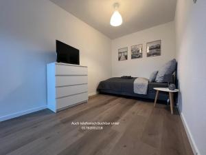 TV a/nebo společenská místnost v ubytování ElasFerienhaus