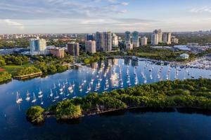 an aerial view of a city with boats in the water at MVR Suite Wellness Like You have Never Felt Before in Miami