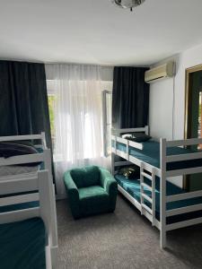 Postel nebo postele na pokoji v ubytování Amazon Hostel Podgorica