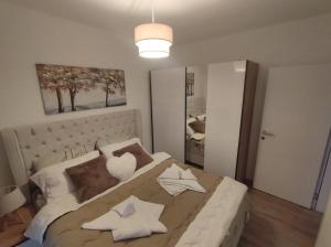 Postel nebo postele na pokoji v ubytování Apartman Jeca