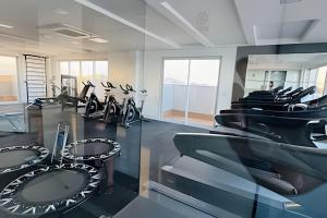 a room with a bunch of bikes in a gym at Infinity Vista Mar in Itaparica