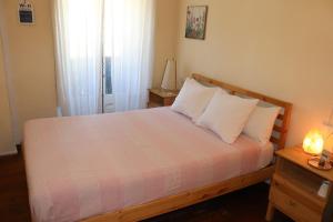 Łóżko lub łóżka w pokoju w obiekcie Les Magranes Bed & Breakfast