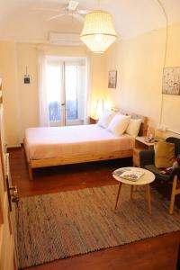 Łóżko lub łóżka w pokoju w obiekcie Les Magranes Bed & Breakfast