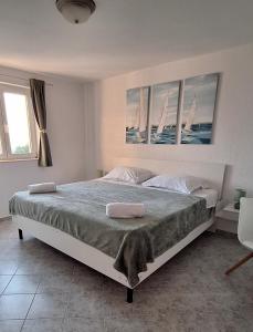 Postel nebo postele na pokoji v ubytování Family and pet friendly apartment Zrinski Croatia
