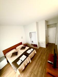 Cama o camas de una habitación en Costa De La Luz