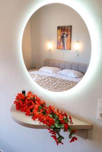 Postel nebo postele na pokoji v ubytování Aldebaran Hotel Apartments