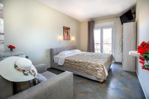 Postel nebo postele na pokoji v ubytování Aldebaran Hotel Apartments + 37 fotografií