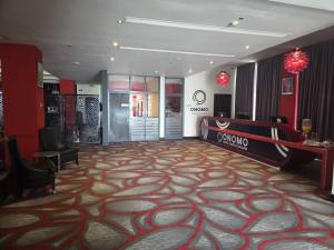 a large room with a carpet on the floor at Onomo Hotel Dar es Salaam in Dar es Salaam
