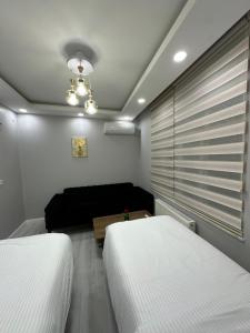 Postel nebo postele na pokoji v ubytování Sultanahmet Immortelle Apartment