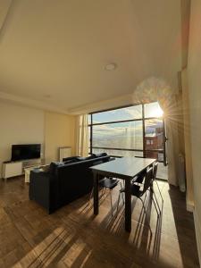 Et tv og/eller underholdning på Apartamentos Sur RG