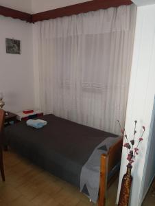 Postel nebo postele na pokoji v ubytování DORA'S HOUSE Douneika