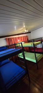 Llit o llits en una habitació de SelfStay Inn Faaa