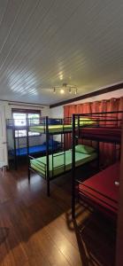 Llit o llits en una habitació de SelfStay Inn Faaa