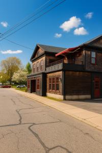 an old building on the side of a street at Magical Post And Beam Loft Downtown Newport! in Newport