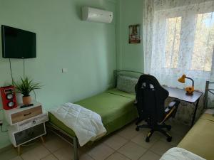 TV a/nebo společenská místnost v ubytování George's family friendly maisonette with great exterior