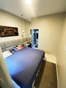 Giường trong phòng chung tại Casa para COP-30 Porto Marina Residence