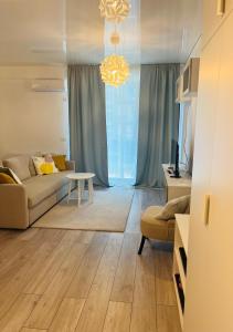 Χώρος καθιστικού στο DXN Luxury Studio 8 by Almar +2 φωτογραφίες