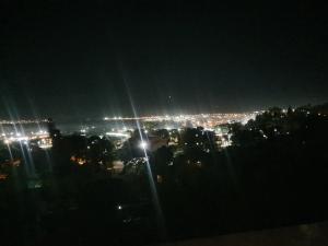 a view of a city at night with lights at Townview Estate in Ladysmith +11 photos