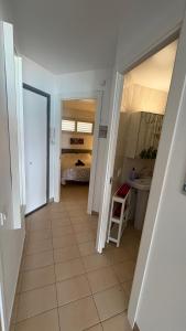 A bed or beds in a room at Apartments Paradise Lloret