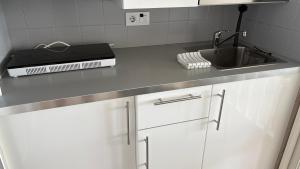 A kitchen or kitchenette at Apartments Paradise Lloret