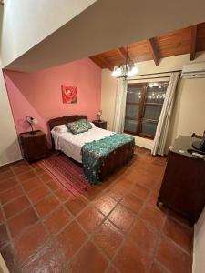 a bedroom with a bed in a room at Establecimiento Don Elder in Sunchales