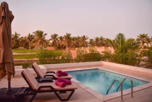Bazén v ubytování Segal Rotana Salalah Villa wz Private S Pool nebo v jeho okolí
