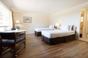 Postel nebo postele na pokoji v ubytování Astoria Crest Hotel + 37 fotografií