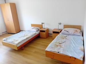 Postel nebo postele na pokoji v ubytování ubytovanie v súkromí Suvada