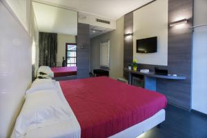 Postel nebo postele na pokoji v ubytování Break Hotel