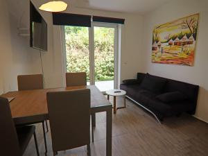 Posezení v ubytování Haus am Gardersee mit Garten