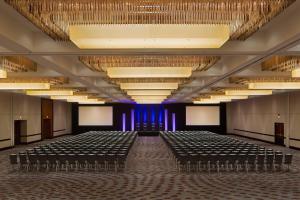 an empty auditorium with rows of chairs and lights at Hyatt Regency Cincinnati in Cincinnati