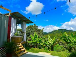 a house with a view of the mountains at Casa Vagon Villa Janer in San Lorenzo