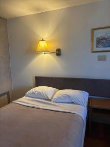 Postel nebo postele na pokoji v ubytování The Bridgewater Hotel