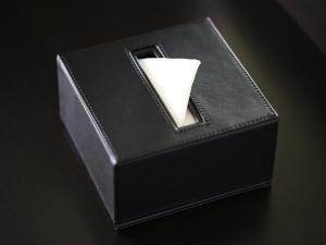 a black box with a white paper in it at APA Hotel Akihabara Ekimae in Tokyo