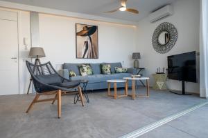 TV a/nebo společenská místnost v ubytování Sabbia Suites Infinity