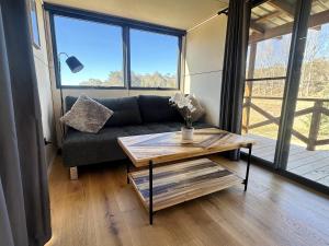 Posezení v ubytování Wombat Creek Tiny House