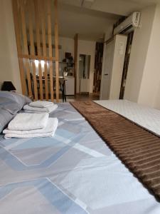 Postel nebo postele na pokoji v ubytování Apartmani S - DSN