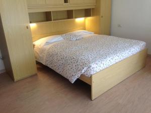 Postel nebo postele na pokoji v ubytování Residence Geranio