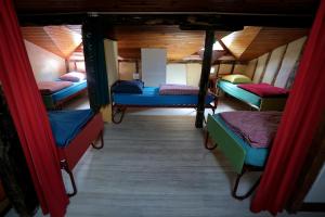 Postel nebo postele na pokoji v ubytování Le Grangé