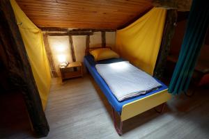 Postel nebo postele na pokoji v ubytování Le Grangé