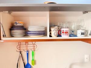 Una cocina o zona de cocina en Exclusivity in Itajaí Port with Wi-Fi and Jacuzzi
